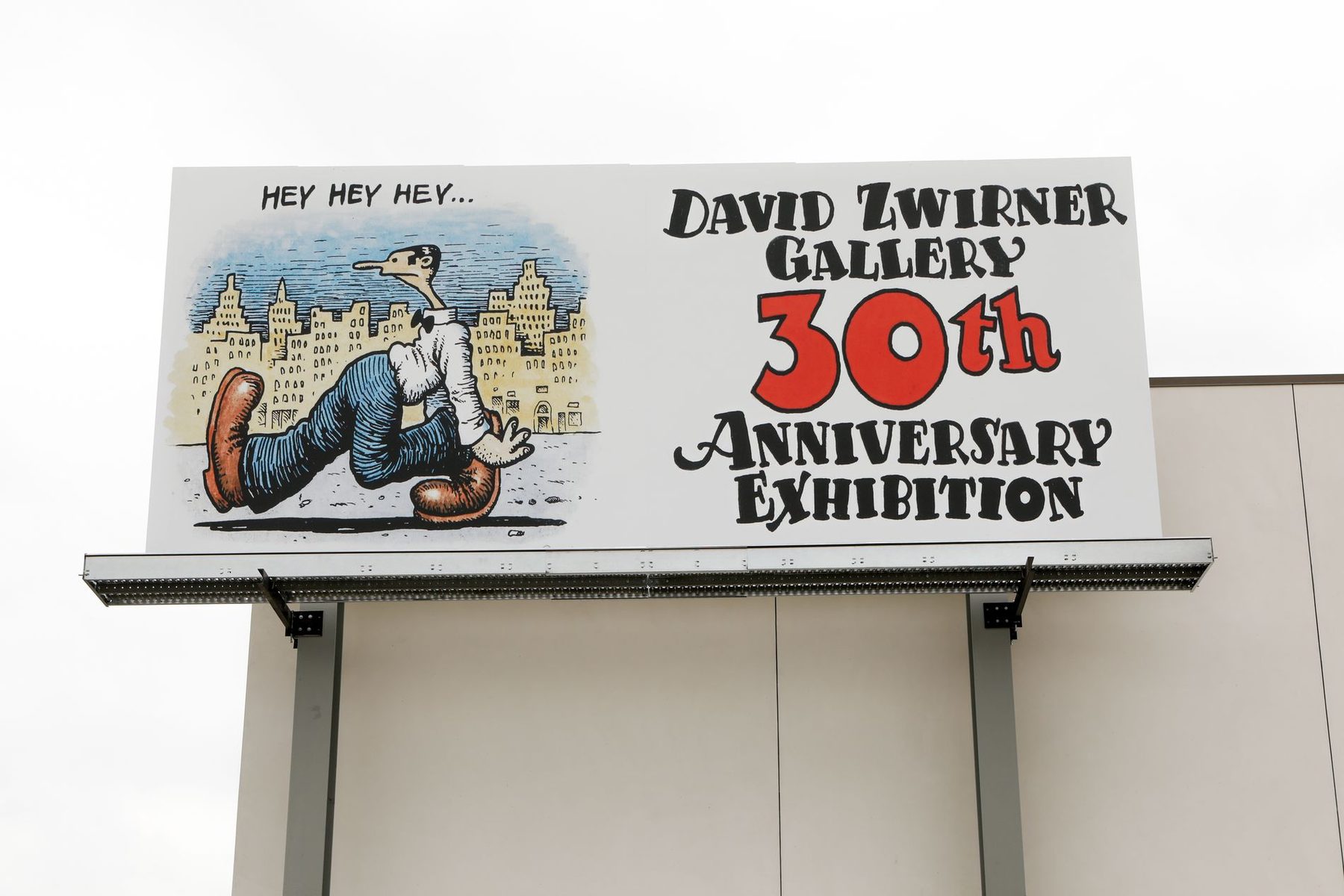 A hand-painted billboard reading David Zwirner Gallery 30th Anniversary Exhibition