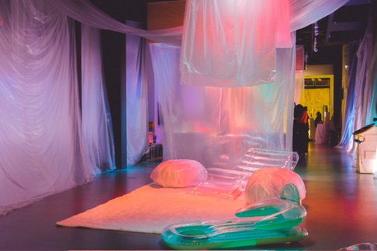 Translucent inflatable furniture under colored light