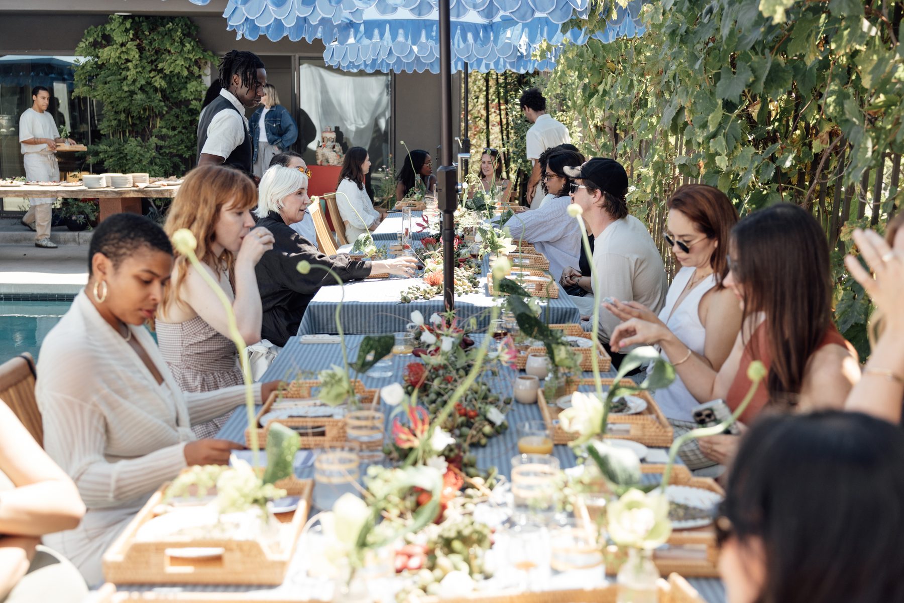 Guests gathered at the poolside lunch